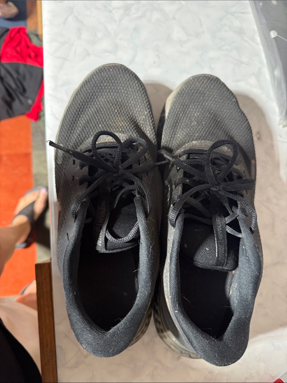 Nike All-Black Mesh Lace-Up Athletic Sneakers